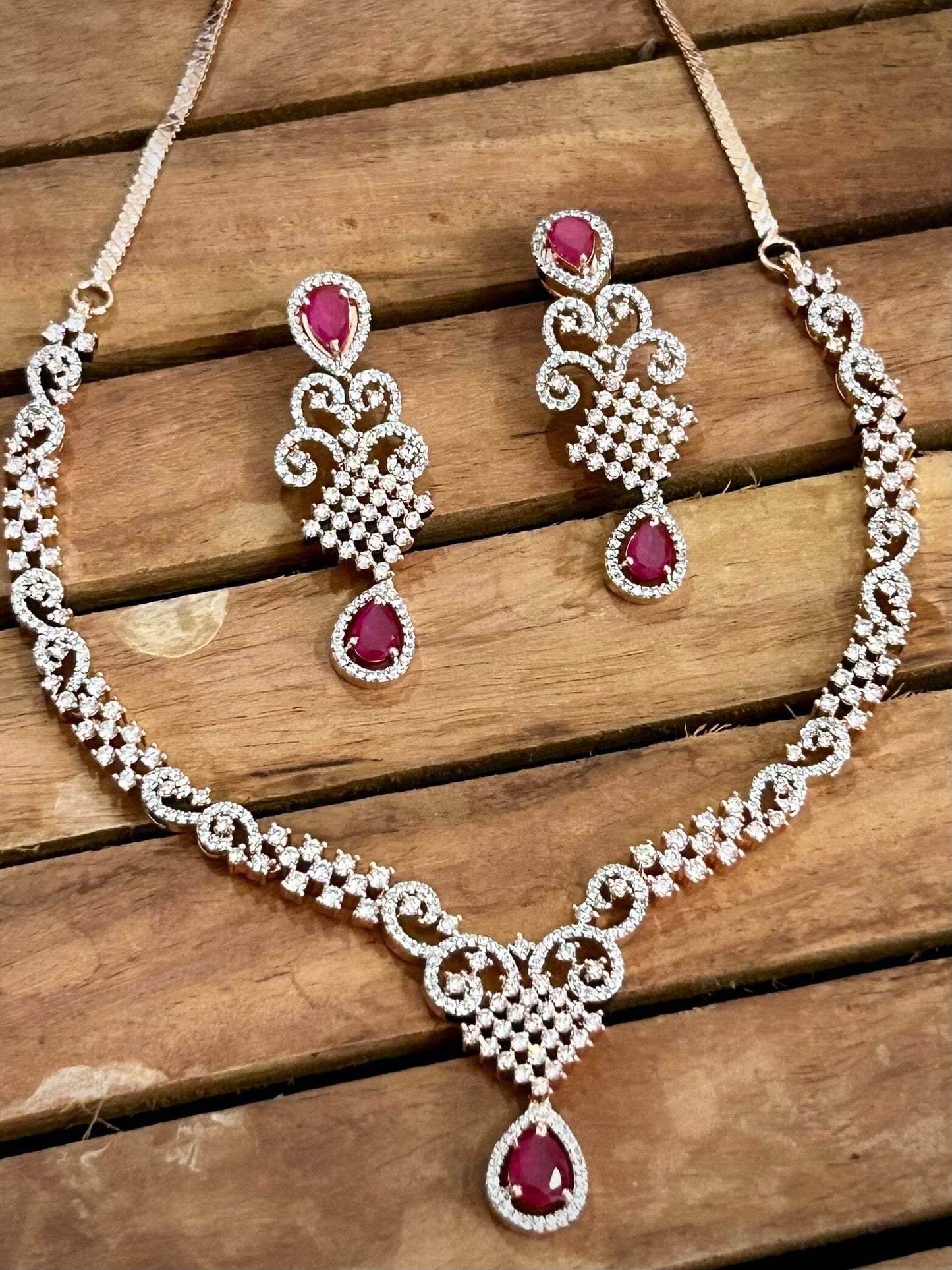 American Diamond necklace with pink stones and rose gold polish