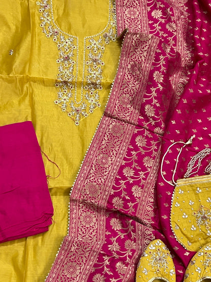 Banarasi Embroidered Dress Material with Matching Potli