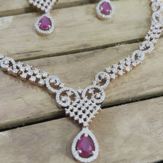 American Diamond necklace with pink stones and rose gold polish