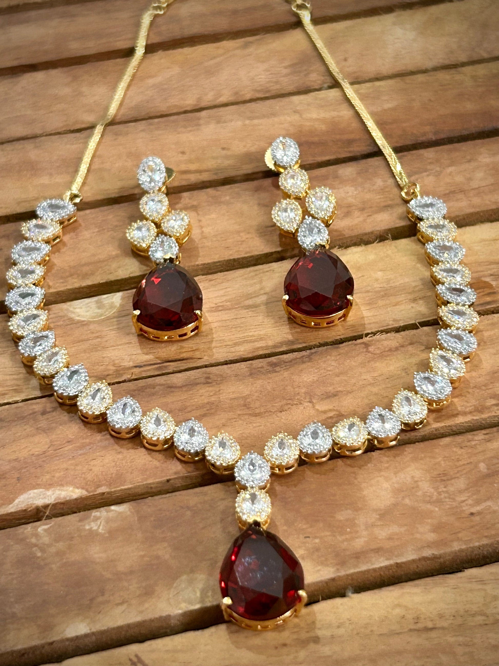  American Diamond necklace with pink stones and rose gold polish