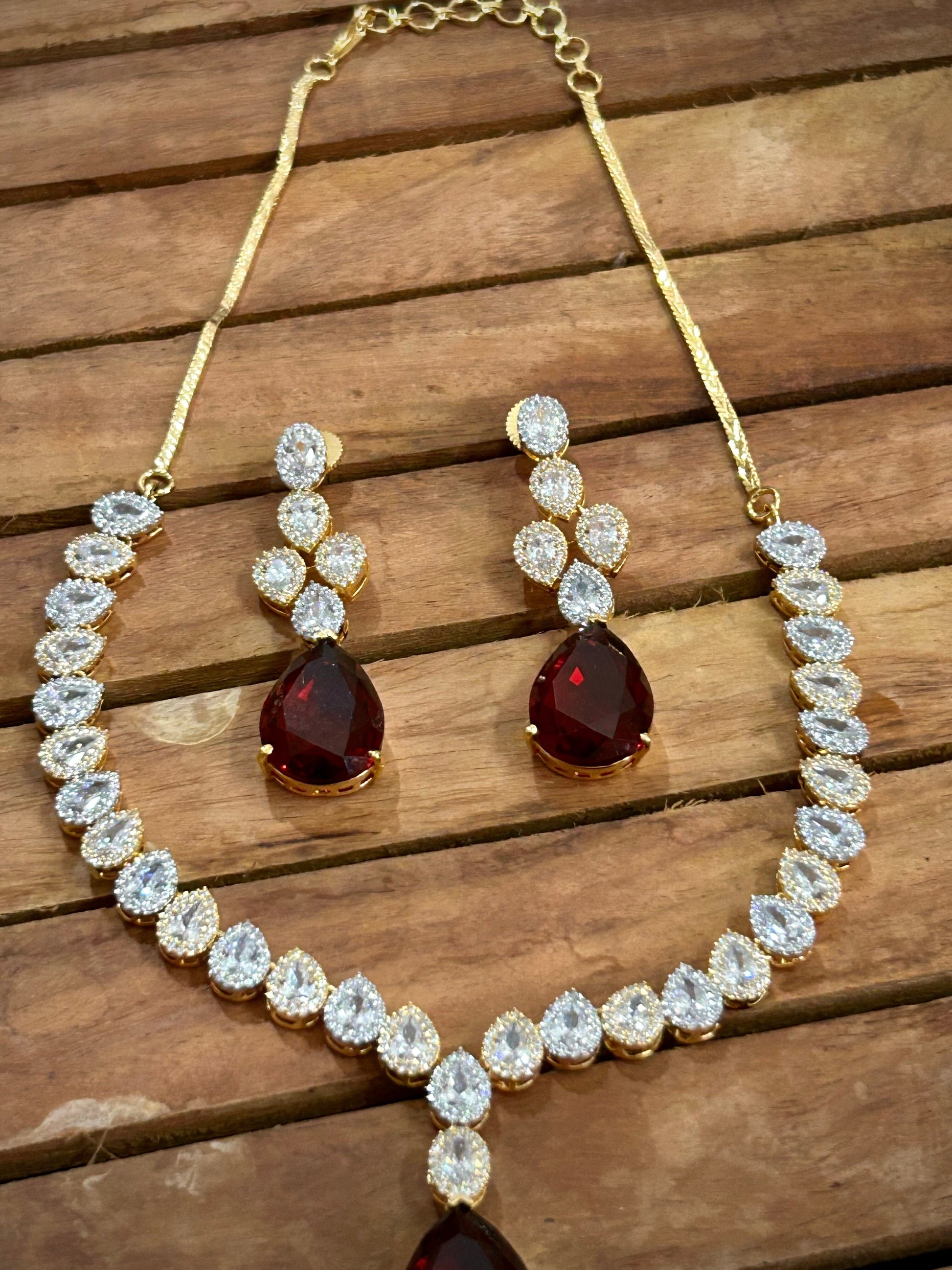 American Diamond necklace with pink stones and rose gold polish